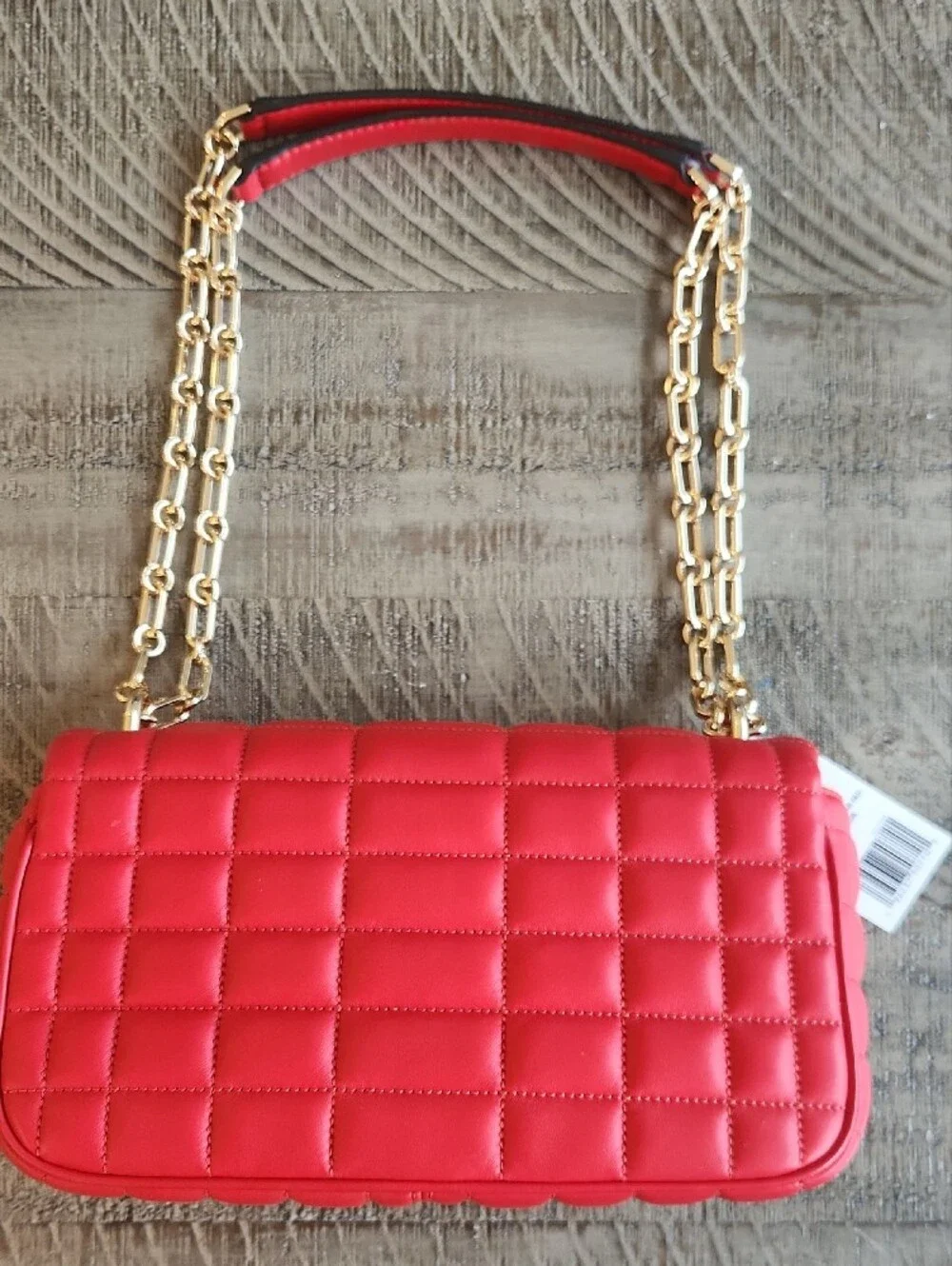 Michael Kors that shoulder just